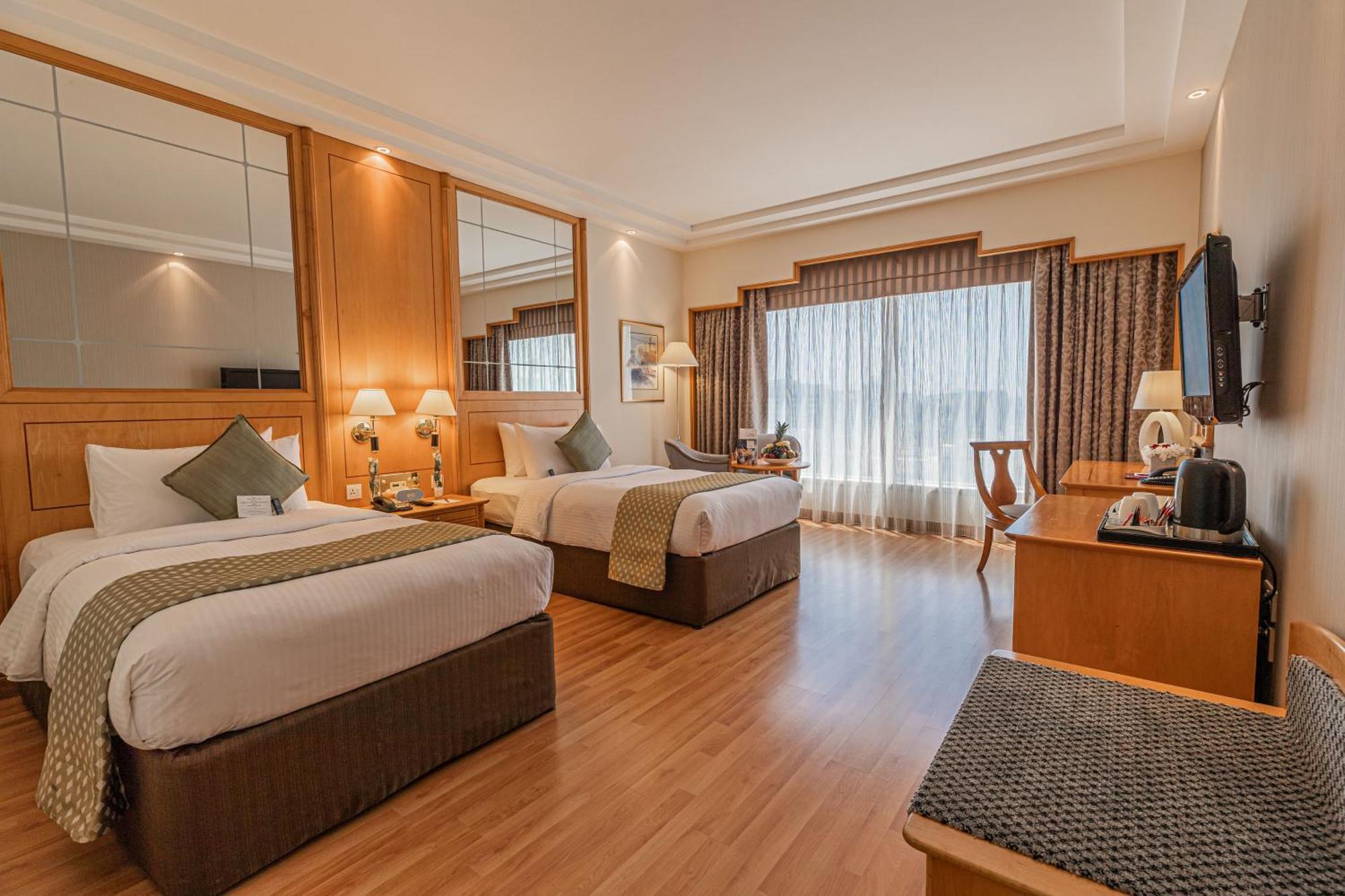 Hotel Millennium Downtown Abu Dabi Exterior foto Deluxe Room